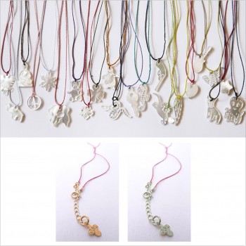 Silk thread necklace with oyster shell charm