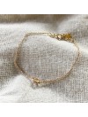Bracelet mini Cauris sur chaine en plaqué or - bijoux fins et tendances
