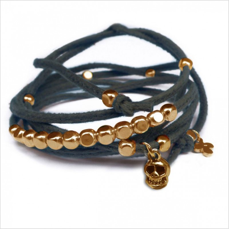 Mini skull charms on knotted suede link